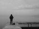 woman standing on dock