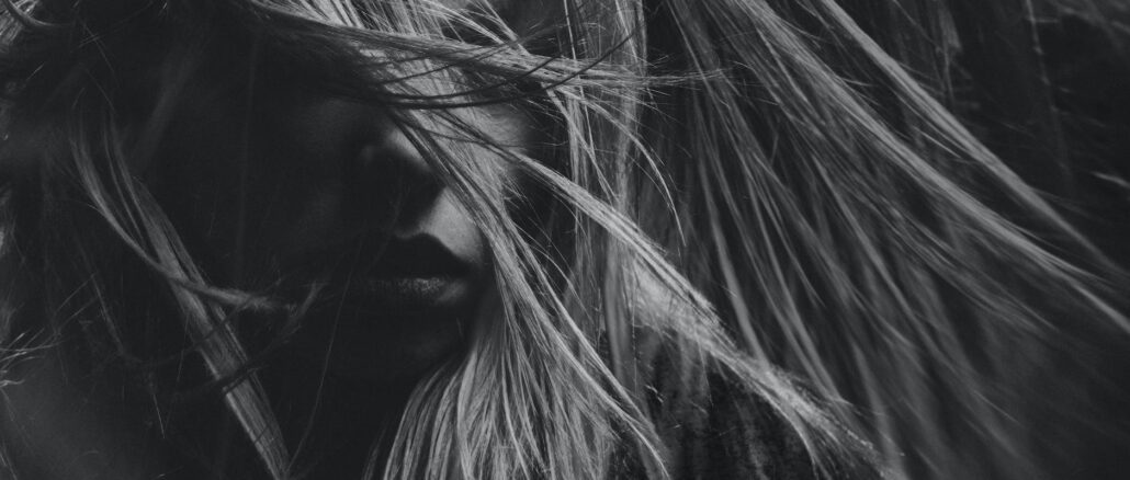 grayscale photo of woman